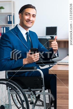 Young male employee in wheel-chair 113105636