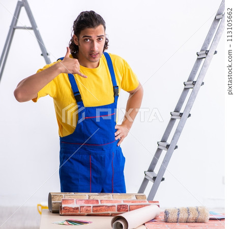 Young man contractor doing renovation at home 113105662