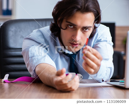 Young man having problems with narcotics at workplace Young man having problems with narcotics at workplace 113106009