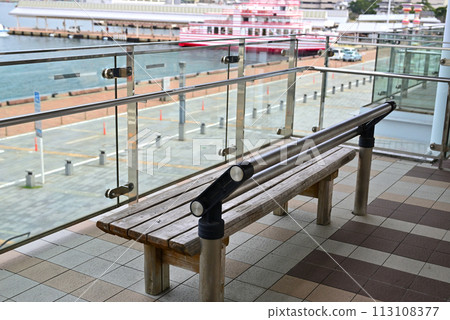 Wooden bench at the harbor Wooden bench at the harbor 113108377