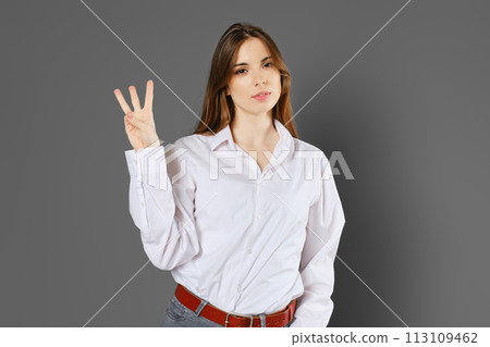 Smart woman shows three fingers 113109462
