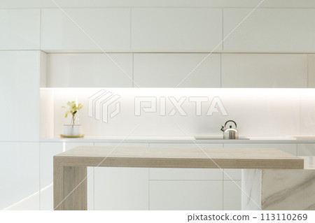 Blank empty wooden table board on white color modern kitchen interior background Blank empty wooden table board on white color modern kitchen interior background 113110269