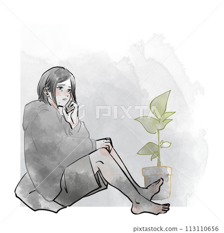 Woman sitting on the floor and talking on a smartphone Woman sitting on the floor and talking on a smartphone 113110656