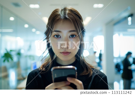 Confident Businessman  happy executive colleagues partners having conversation discussing standing in Modern corporate office 113111242