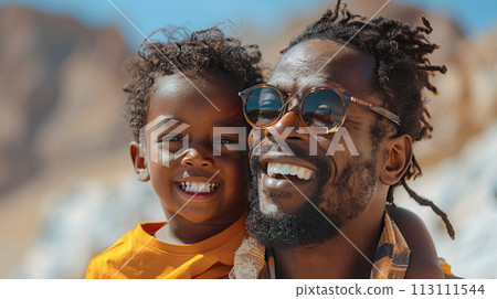 Portrait of a father with his son on a walk in the park, happy laughing people on a bright sunny day, father's day poster Portrait of a father with his son on a walk in the park, happy laughing people on a bright sunny day, father's day poster 113111544