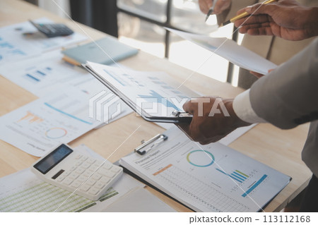 Finance manager meeting discussing company growth project success financial statistics, professional investor working start up project for strategy plan with document, laptop and digital tablet. 113112168
