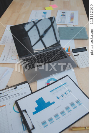 Finance manager meeting discussing company growth project success financial statistics, professional investor working start up project for strategy plan with document, laptop and digital tablet. 113112169