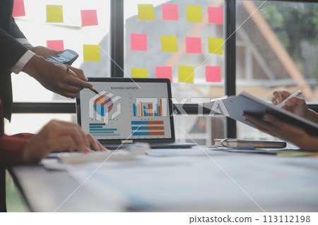 Finance manager meeting discussing company growth project success financial statistics, professional investor working start up project for strategy plan with document, laptop and digital tablet. 113112198