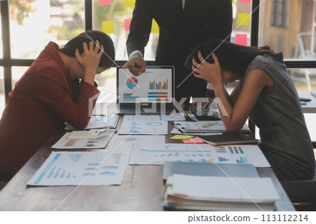 Frustrated upset multiracial business team people sad with bad work result in report disappointed in corporate bankruptcy failure crisis worried of paperwork problem sit at table at office meeting 113112214