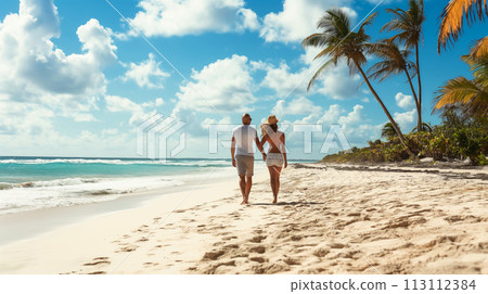 Couple of tourists walking on the beach along the ocean, Caribbean islands vacation invitation, magnificent morning seascape, cruise advertising concept and seaside vacation invitation Couple of tourists walking on the beach along the ocean, Caribbean islands vacation invitation, magnificent morning seascape, cruise advertising concept and seaside vacation invitation 113112384