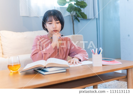 Women studying at home/reading/reskilling 113113113