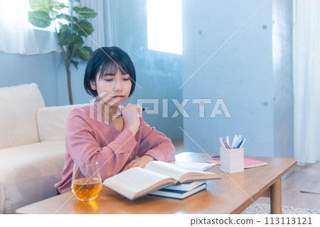 Women studying at home/reading/reskilling Women studying at home/reading/reskilling 113113121