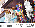 Seashell mobiles lined up in souvenir shops overseas 113113886