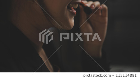 Young woman working in call centre, surrounded by colleagues Young woman working in call centre, surrounded by colleagues 113114881