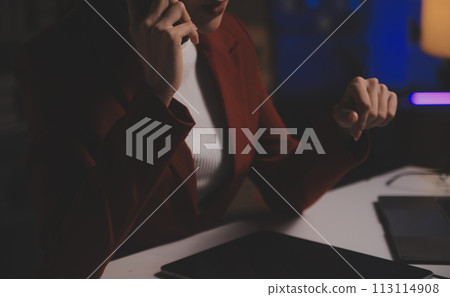 Business woman using calculator for do math finance on wooden desk in office and business working background, tax, accounting, statistics and analytic research concept 113114908