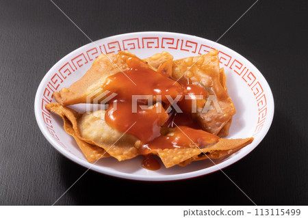 Fried wonton with sweet and sour sauce Fried wonton with sweet and sour sauce 113115499