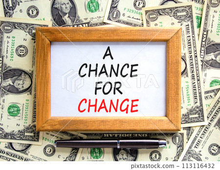 A chance for change symbol. Concept words A chance for change on beautiful wooden frame. Black pen. Beautiful dollar bills background. Dollar bills. Business A chance for change concept. Copy space. A chance for change symbol. Concept words A chance for change on beautiful wooden frame. Black pen. Beautiful dollar bills background. Dollar bills. Business A chance for change concept. Copy space. 113116432