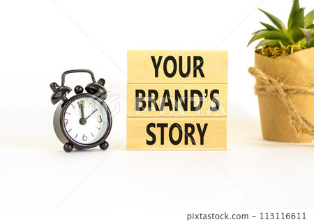 Branding and your brand story symbol. Concept words Your brands story on beautiful wooden blocks. Beautiful white background. Black alarm clock. Business branding your brand story concept. Copy space. 113116611