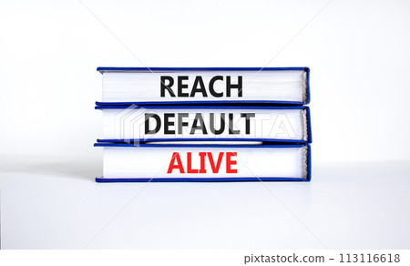 Reach default alive symbol. Concept words Reach default alive on books on a beautiful white table white background. Business, finacial and reach default alive concept. 113116618