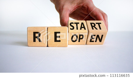 Reopen and restart symbol. Businessman hand turns cubes and changes the word 'reopen' to 'restart'. Beautiful white background. Business and reopen - restart concept. Copy space. Reopen and restart symbol. Businessman hand turns cubes and changes the word 'reopen' to 'restart'. Beautiful white background. Business and reopen - restart concept. Copy space. 113116635