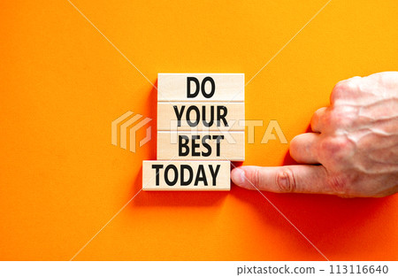 Do your best today symbol. Concept words Do your best today on beautiful wooden block. Beautiful orange table background. Businessman hand. Business motivational do your best today concept. Copy space 113116640