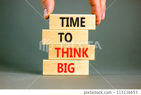 Time to think big symbol. Concept words Time to think big on beautiful wooden block. Beautiful grey table grey background. Businessman hand. Business and time to think big concept. Copy space. 113116653