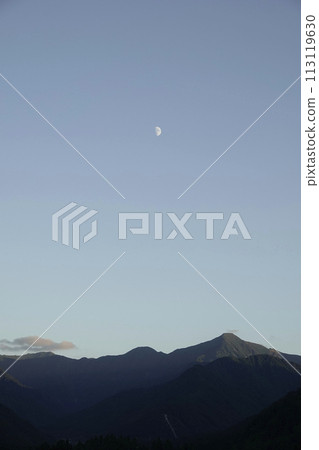 Mountains and moon at twilight Mountains and moon at twilight 113119630