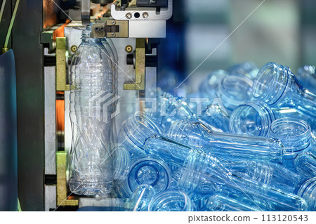 Abstract scene the drinking water bottle manufacturing process by blow mold machine. 113120543