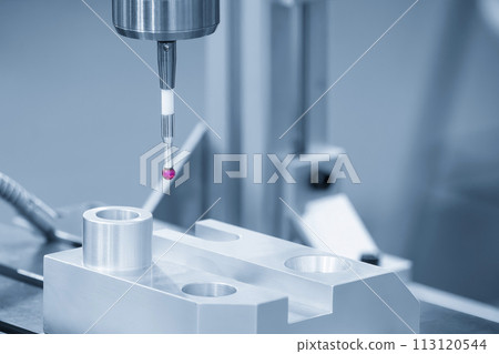 The  CMM probe measuring the  aluminum automotive parts. 113120544