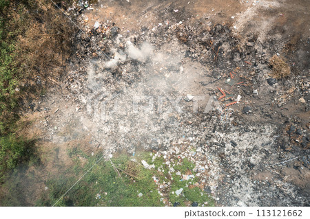 Garbage, fire burning in landfill, effects to environmental. 113121662