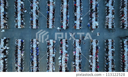 Muslims having iftar together during Ramadan Muslims having iftar together during Ramadan 113122528