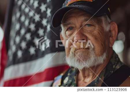 Elderly veteran in front of the American flag. Elderly veteran in front of the American flag. 113123906