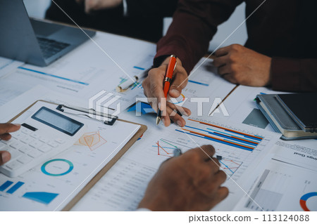 Business team collaboration discussing working analyzing with financial data and marketing growth report graph in team, presentation and brainstorming to strategy planning making profit of company. Business team collaboration discussing working analyzing with financial data and marketing growth report graph in team, presentation and brainstorming to strategy planning making profit of company. 113124088