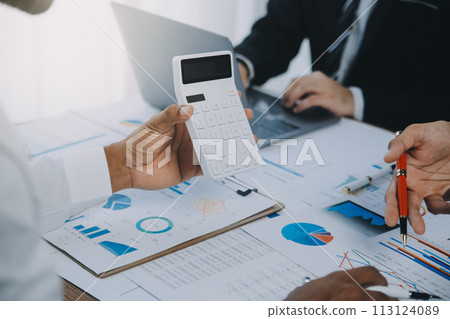 Business team collaboration discussing working analyzing with financial data and marketing growth report graph in team, presentation and brainstorming to strategy planning making profit of company. Business team collaboration discussing working analyzing with financial data and marketing growth report graph in team, presentation and brainstorming to strategy planning making profit of company. 113124089