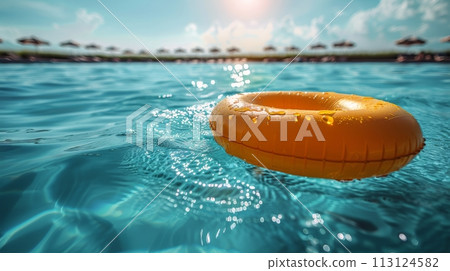 Inflatable Swimming Ring Drifting on Water Inflatable Swimming Ring Drifting on Water 113124582