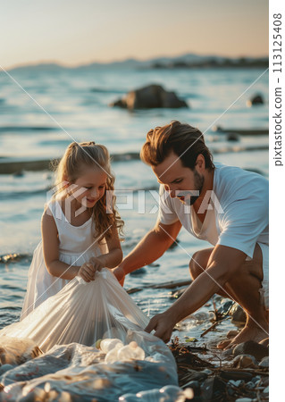 Caucasian father and daughter are helping to collect trash on the beach. 113125408