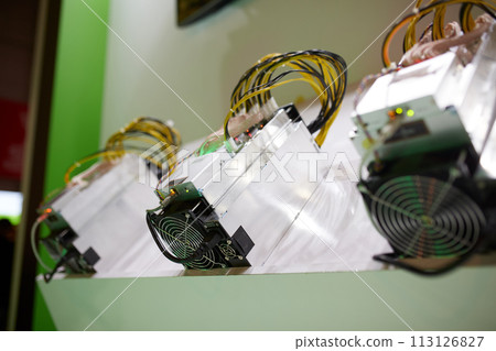 Cryptocurrency mining equipment - ASIC - application specific integrated circuit on farm stand Cryptocurrency mining equipment - ASIC - application specific integrated circuit on farm stand 113126827