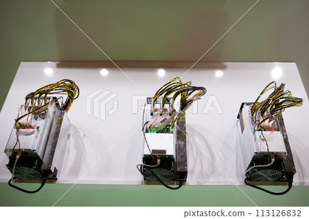 Cryptocurrency mining equipment - ASIC - application specific integrated circuit on farm stand Cryptocurrency mining equipment - ASIC - application specific integrated circuit on farm stand 113126832