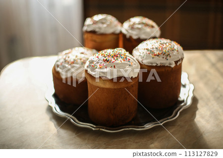 Authentic Traditional Russian Orthodox Easter bread the kulich or pasha, easter cakes topped with sugar glaze Authentic Traditional Russian Orthodox Easter bread the kulich or pasha, easter cakes topped with sugar glaze 113127829