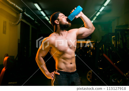 man in the gym with shaker man in the gym with shaker 113127918
