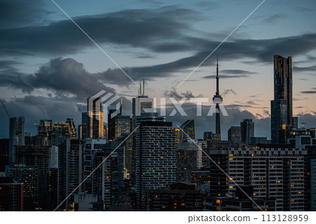 sunset over Toronto city downtown skyline, sunrise over CN Tower and skyscrapers of financial district Canada sunset over Toronto city downtown skyline, sunrise over CN Tower and skyscrapers of financial district Canada 113128959