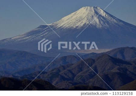 Snow-covered Mt. Fuji seen from the summit of Mt. Sodehira in Tanzawa 113129158