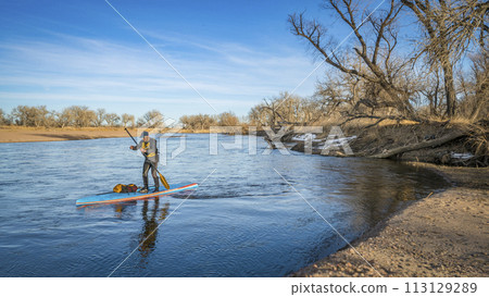 Expedition style winter stand up paddling on the South Platte RIver in eastern Colorado Expedition style winter stand up paddling on the South Platte RIver in eastern Colorado 113129289