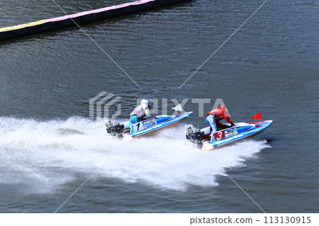 Scene from a motorboat race: The fight just after the turn, at the boat racing stadium Scene from a motorboat race: The fight just after the turn, at the boat racing stadium 113130915