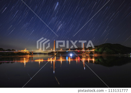 Summer starry scenery in Setouchi: Bridge over Ojima and star trails 113131777