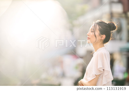 Young woman enjoying shopping in the city at sunset Young woman enjoying shopping in the city at sunset 113131919