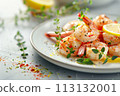 Grilled shrimp adorned with thyme and lemon on a plate, showcasing the vibrant colors and freshness of the dish. 113132001