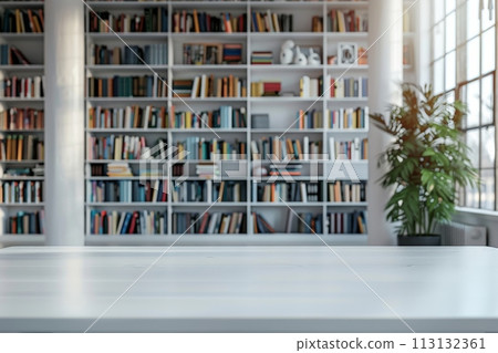 A white room with a wooden table and a shelf full of books A white room with a wooden table and a shelf full of books 113132361