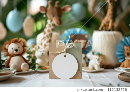 A table with a giraffe cake and other animal cakes 113132756