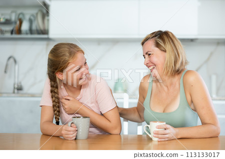 During tea party, girl laugh and tell mother plot of modern new comedy, movies During tea party, girl laugh and tell mother plot of modern new comedy, movies 113133017